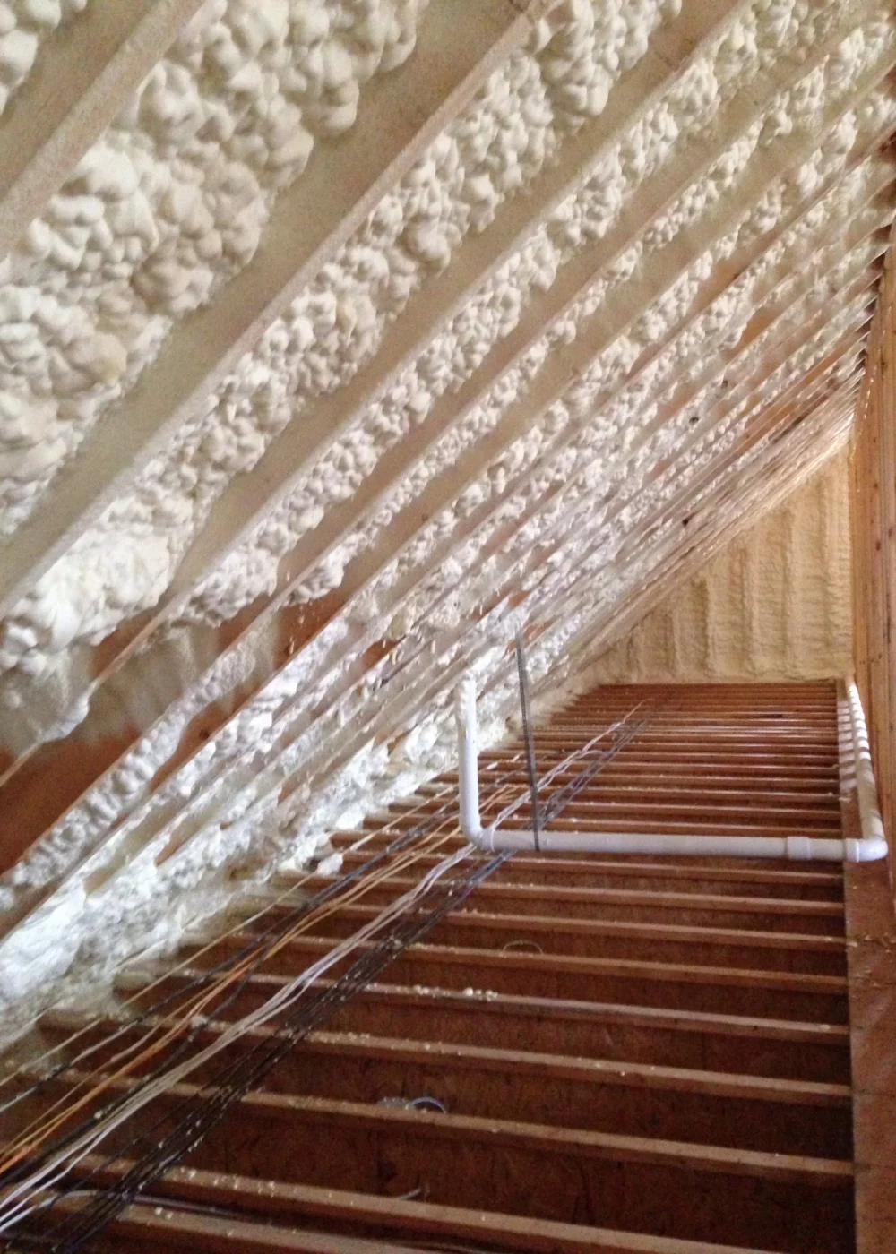 new-house-or-home-attic-rafters-with-spray-insulat-2024-12-02-12-18-06-utc new-house-or-home-attic-rafters-with-spray-insulat-2024-12-02-12-18-06-utc